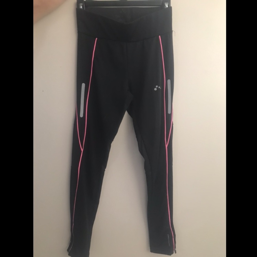 Black leggings with pink and blue details